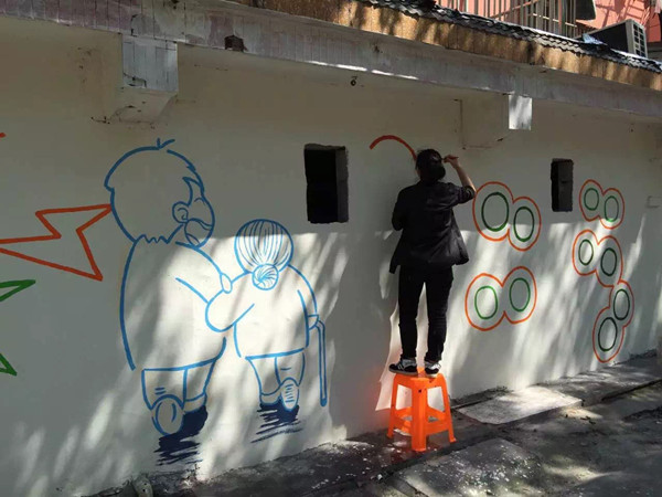 &ldquo;绘出我的中国梦，美化拆违外墙&rdquo;文明标语涂鸦志愿活动
